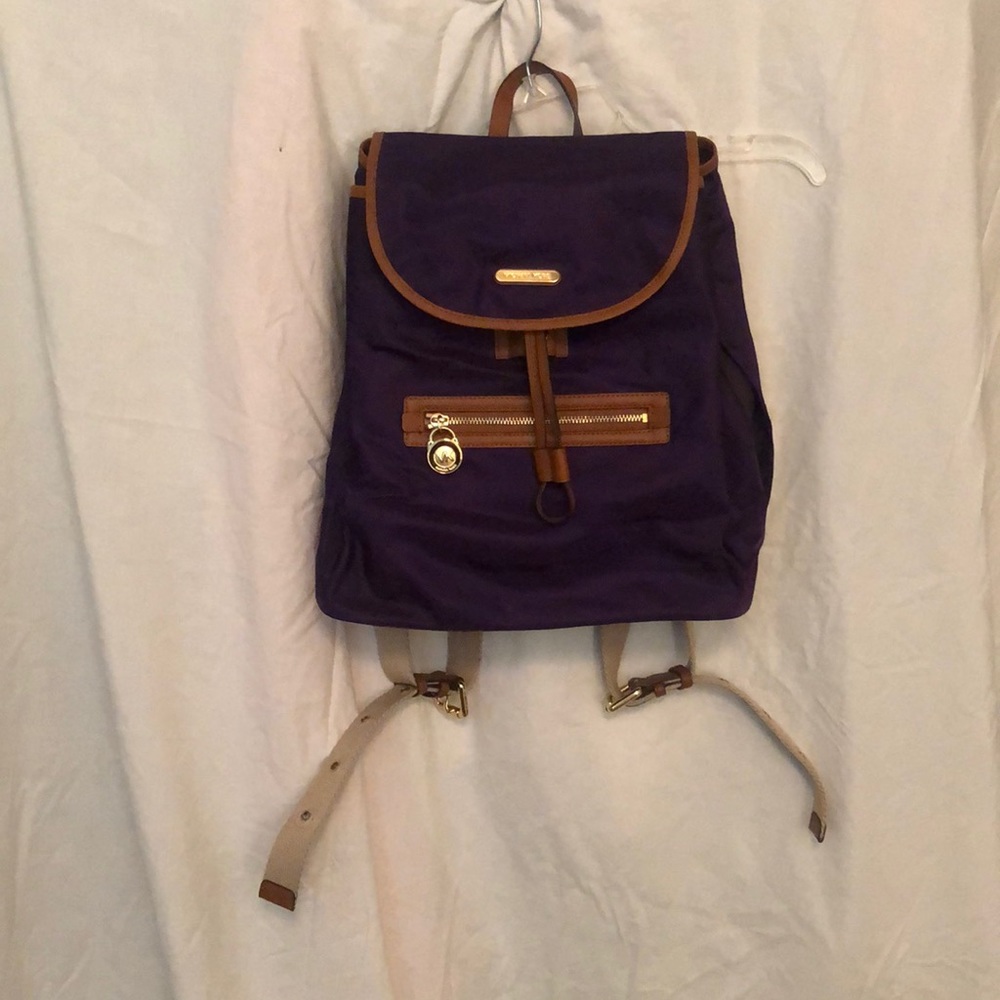 Michael Kors dark purple backpack with side zipper